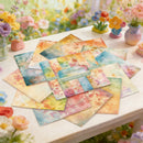 Colorful floral cards on a table with flowers in the background