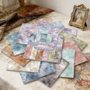 Collection of scrapbooking paper sheets with 'Aether' branding on a decorative surface.
