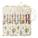 Pouch with colorful pens and a nature-themed design on a white background
