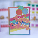Colorful birthday card with balloons and 'Happy Birthday' text on a blurred background