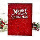 Red Christmas card with 'Merry Christmas' text on a white background