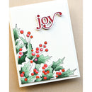 Christmas card with holly design and 'joy' text on a beige background