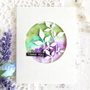 Card with floral design and 'Thank you' text on a textured background
