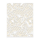 Decorative paper with intricate cut-out pattern on a white background