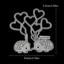 Metal cutting die with hedgehogs and heart-shaped balloons on a black background