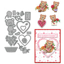 Set of metal dies with teddy bear and heart designs, along with a sample card.