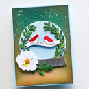 Greeting card with birds, flowers, and 'Joy to the World' text on a textured background