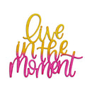 Colorful text 'live in the moment' with yellow to pink gradient on a white background