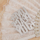 Metal die cut with text on a lace background