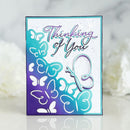 Card with butterfly designs and 'Thinking of You' text on a gradient background