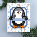 Card with a penguin design and 'Season's Greetings' text on a light blue background.