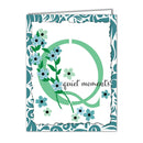Greeting card with floral design and 'quiet moments' text on a decorative border