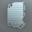 Metallic Indiana-shaped cutting die on a gray background