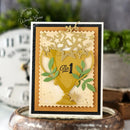 Decorative card with gold trophy design and 'Olo 1' text, featuring Wanda Guess branding.