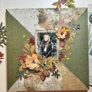 Scrapbook page with floral elements and a photo of a person, featuring autumnal colors.