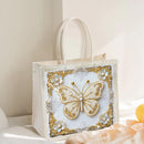 Decorative gift bag with a butterfly design on a light background