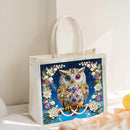 Gift bag with a decorative owl design on a white surface