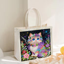 Decorative gift bag with a colorful cat design on a light background