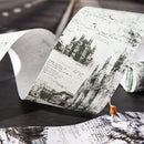 Roll of wallpaper with architectural design and person scaling a wall