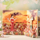 Greeting card with illustration of a woman in a red dress standing in a field of tulips with a sunset background.