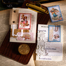 Decorative stationery items on a textured surface with text