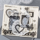 Decorative paper with lace, hearts, and text on a textured surface