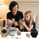 Woman and child crocheting with a Family Fun Crochet Kit, featuring crochet toys and tools.