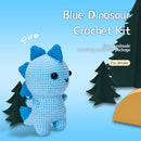 Crocheted blue dinosaur toy with trees on a blue background, labeled 'Blue Dinosaur Crochet Kit'.