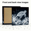 Decorative box with turtle and coral design on front and back, surrounded by small decorative items.