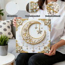 Decorative wall art with pearl embellishments held by a person in a living room setting.