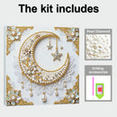 Jewelry-making kit with pearl and gold design on a white background