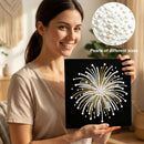 Woman holding a black board with a decorative design made of pearls, with an inset showing pearls of different sizes.
