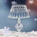 Decorative lamp with a black shade on a snowy background