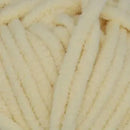 Close-up of beige yarn with a soft focus
