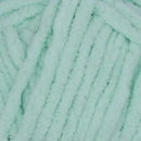 Close-up of teal yarn with a textured surface