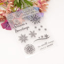 Set of clear stamps with snowflake designs and text on a white background with flowers.