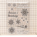 Set of snowflake stamps with text on a grid background