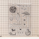 Clear stamps with Christmas designs and text on a grid background