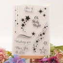 Clear stamp set with star designs and text on a white background with flowers.