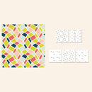 Colorful geometric patterned paper on a beige background