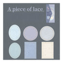 Set of lace pieces on a gray card with text 'A piece of lace'.