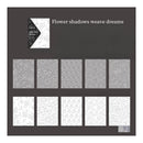 Set of floral patterned cards on a dark background with text 'Flower shadows weave dreams'.