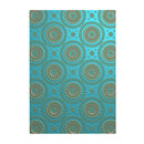 Patterned paper with decorative design on a blue background