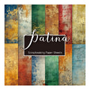 Scrapbooking paper sheets with patina finish in various colors on a colorful striped background.