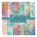 A sheet of scrapbooking paper featuring a pastel watercolor design with vertical stripes in purple, teal, pink, beige, and blue. A teal banner across the center reads 'Paleo Scrapbooking Paper Sheets' with '21017B' in the bottom right corner.