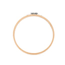 Wooden embroidery hoop on a white background