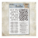 Sheet of paper with black and white patterns and text on a textured beige background