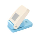 Blue and beige paper punch on a white background