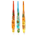Three decorative items with floral designs on a white background