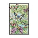 Framed artwork of butterflies and flowers with a scenic background